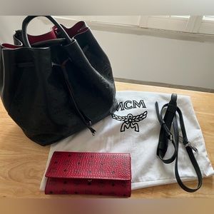 Gently used MCM leather hand bag with cross body strap. Free matching wallet.